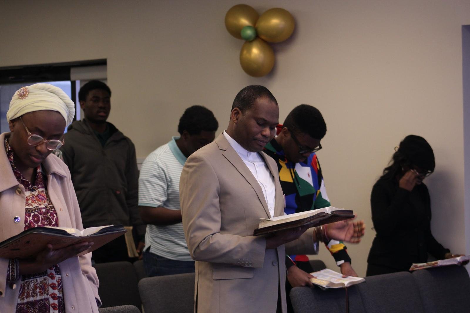Young adults reading the Word together